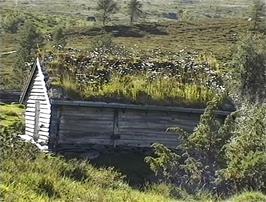 Close to the top, a well-camouflaged hut on the climb from Utvik, 31.5 miles from Stryn, 620m above sea level